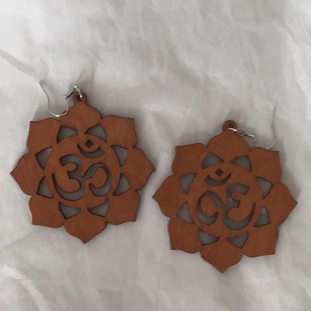 Hand carved wooden pierced earrings